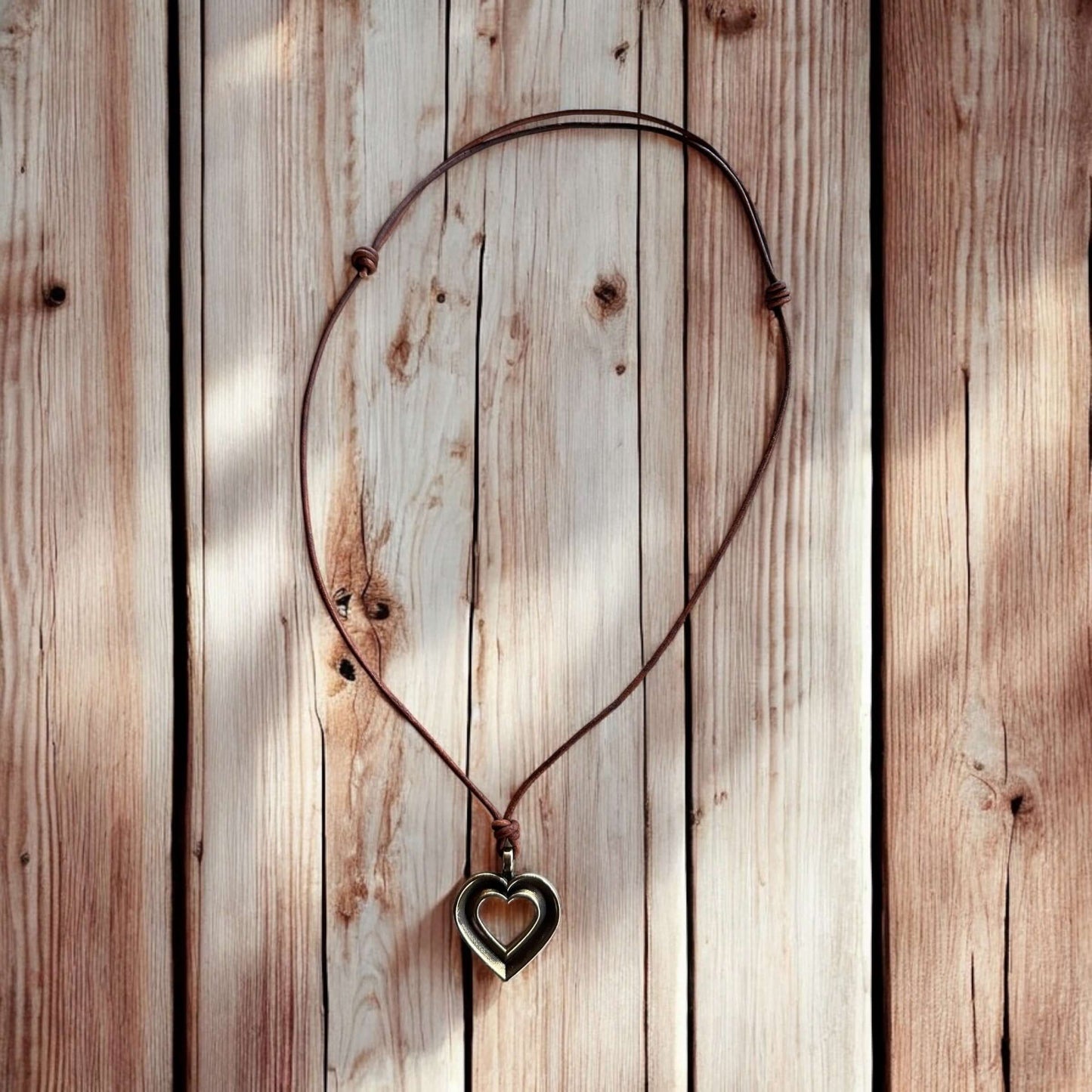 LOVE Heartbeat Necklace - Solid Bronze on Leather Cord